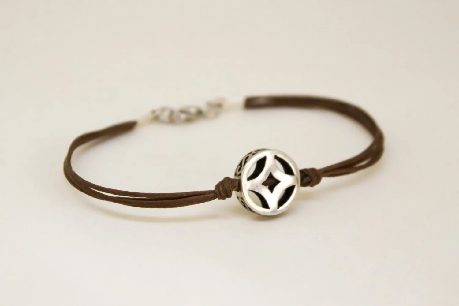 Silver circle bracelet for men, brown cord